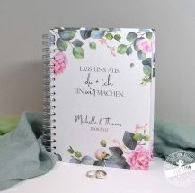 Hochzeitsplaner Buch mit romantischen Rosen